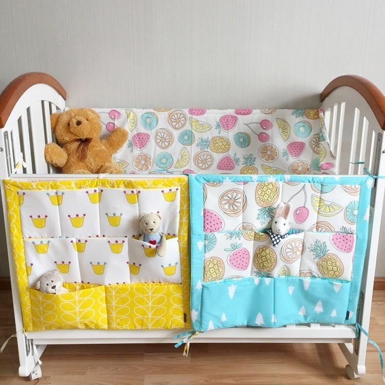 Soft cotton baby crib caddy, perfect for organizing diapers, creams, and essentials.
