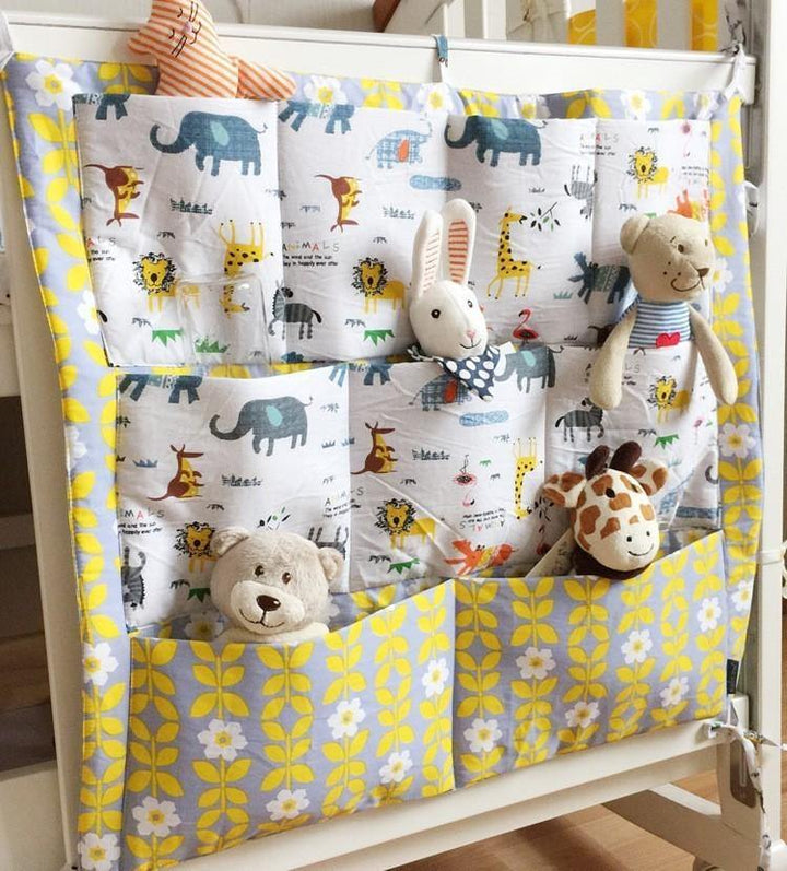 Convenient baby room storage caddy, hooks onto crib, organizes all infant essentials.