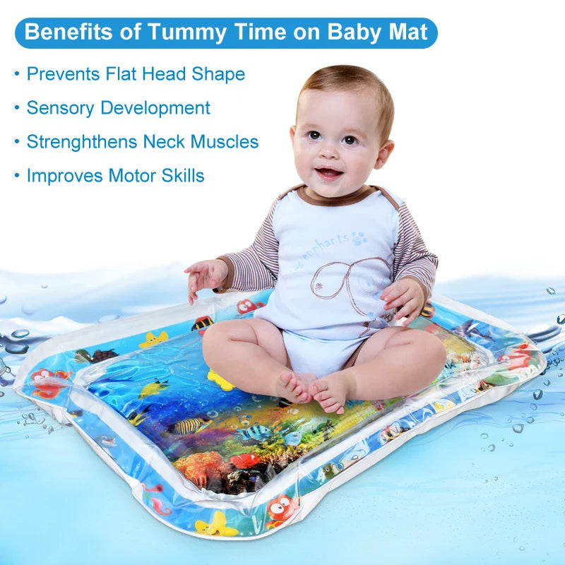 Close-up of baby interacting with floating toys inside sensory infant water mat for tummy time