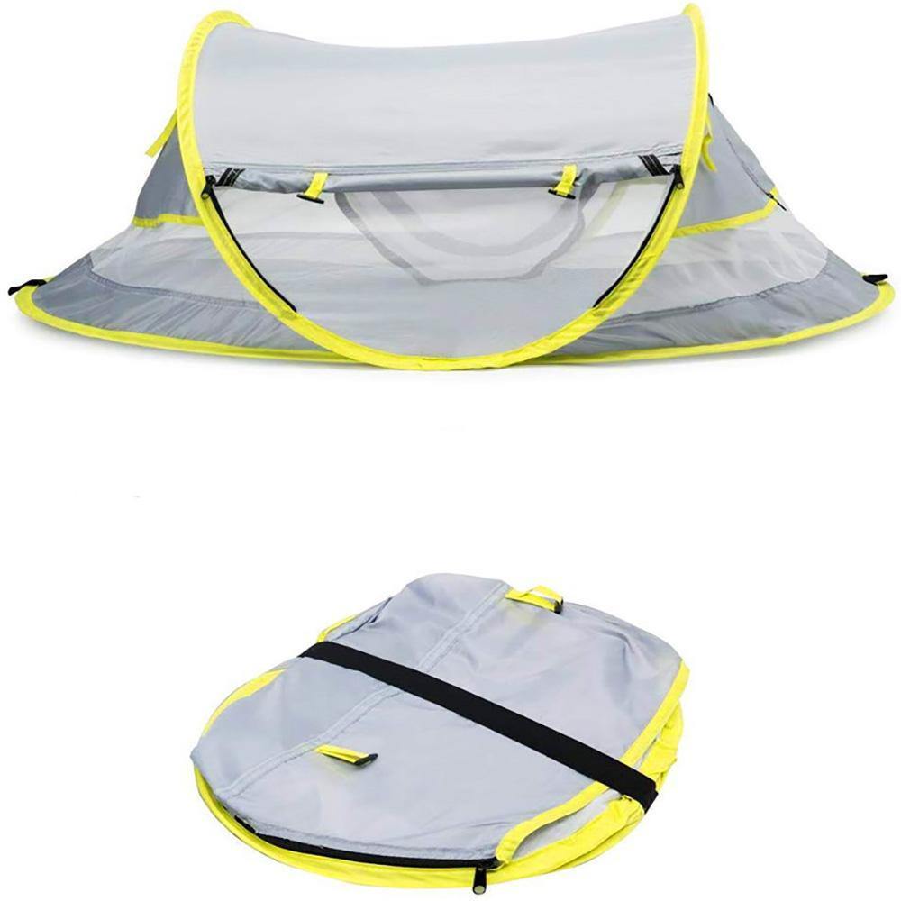 Compact pop-up baby tent with UV protection and mosquito net, ideal for outdoor use and travel.