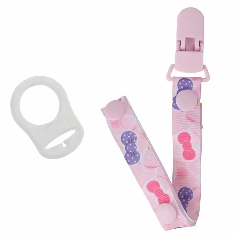 Pink pacifier clip with a durable MAM ring adapter, anti-drop soother holder, baby accessory.