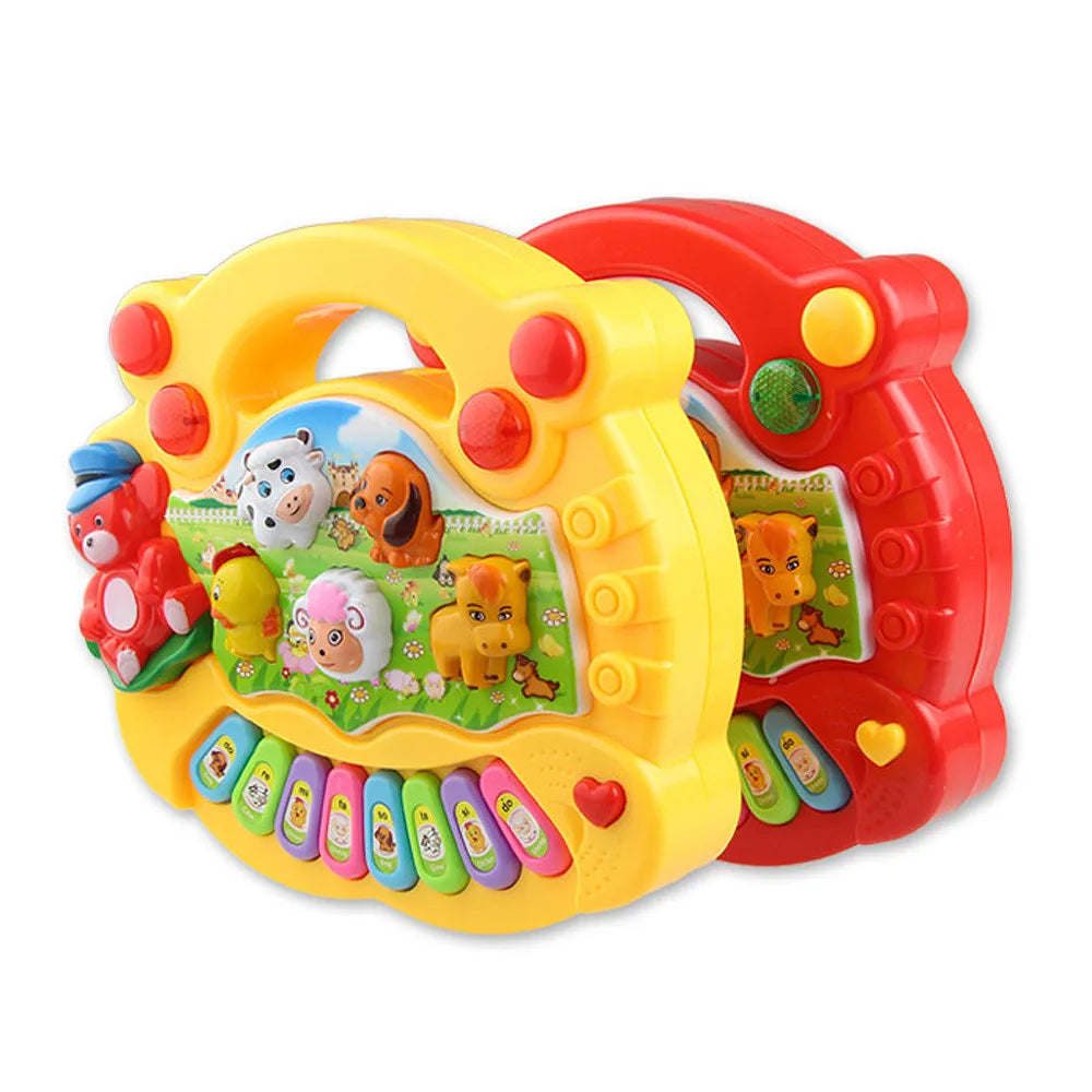 Baby playing animal keyboard toy with lights & sounds for early education