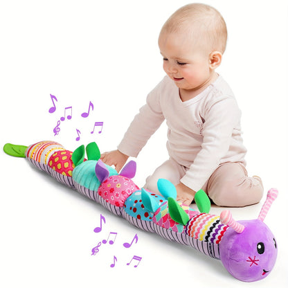 Close-up of a baby plush musical rattle toy, gentle textures for infant sensory development.
