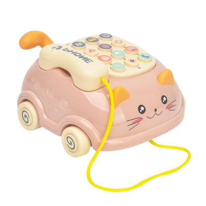 Smiling baby grasping a durable interactive learning phone toy, designed for cognitive development and sensory play.