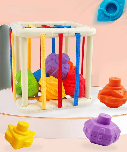 Side profile of Baby Rainbow Shape Sorter, showing different shape cutouts