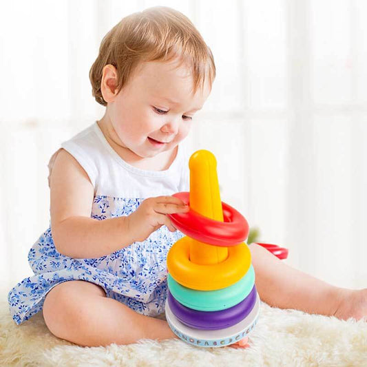 Baby Rainbow Stacking Ring Tower Toy with colorful rings, promoting fine motor skills & cognitive development