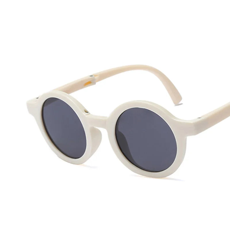 Baby gift idea: foldable green retro round sunglasses, stylish and offering sun protection