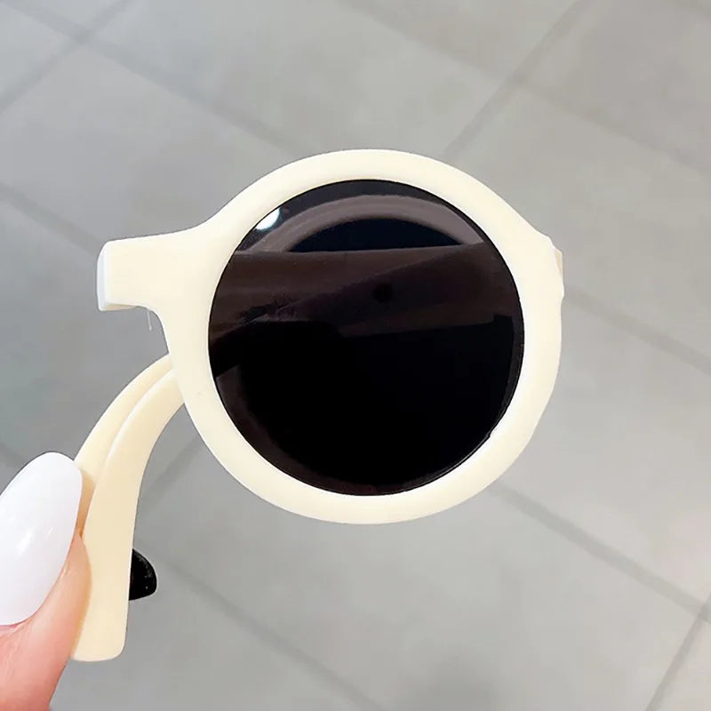Unisex infant retro round sunglasses in sunny yellow, foldable for easy storage & travel