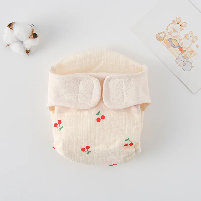 Reusable cotton training pants with adjustable side snaps for a perfect baby fit