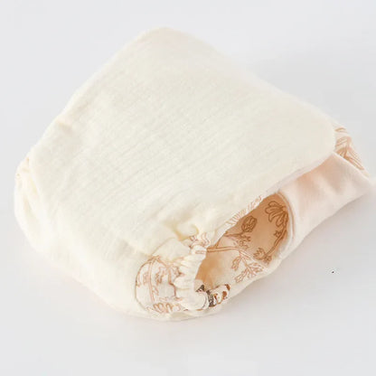 Waterproof baby training pants in a cute pattern, ideal for toilet training essentials
