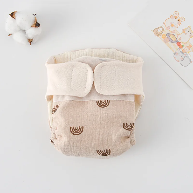 Baby taking a nap in soft reusable cotton training pants, ensuring comfort and dryness
