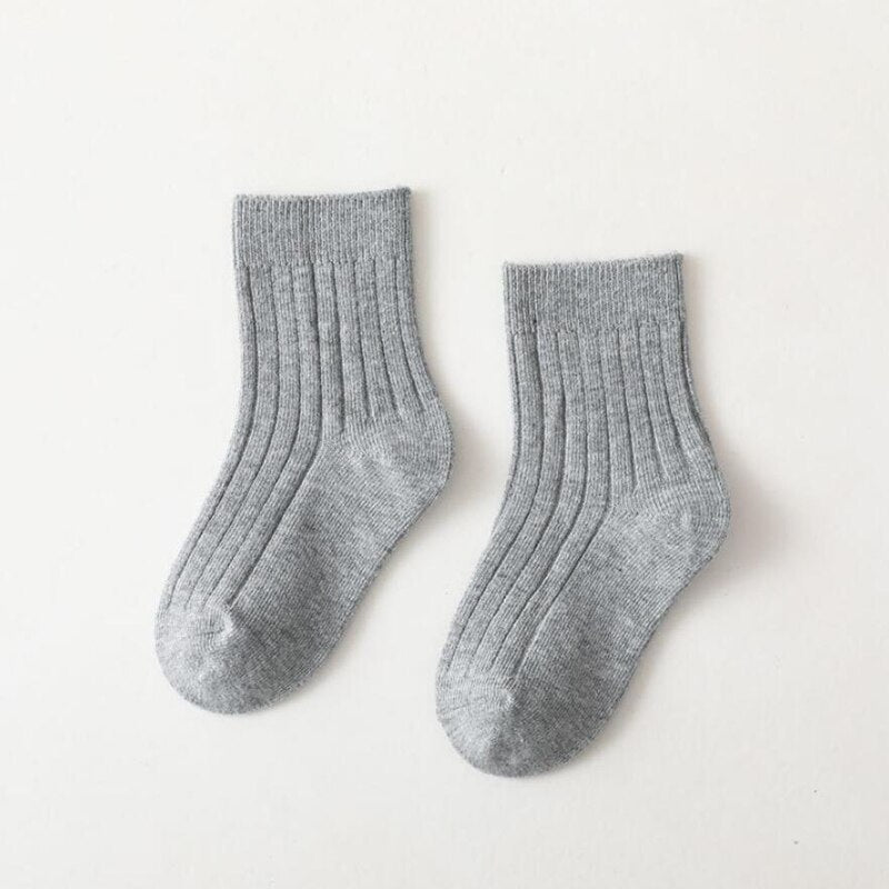 Baby girls' vibrant high neck ribbed socks, soft cotton blend for cozy toddler feet.