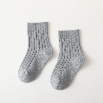 Baby girls' vibrant high neck ribbed socks, soft cotton blend for cozy toddler feet.