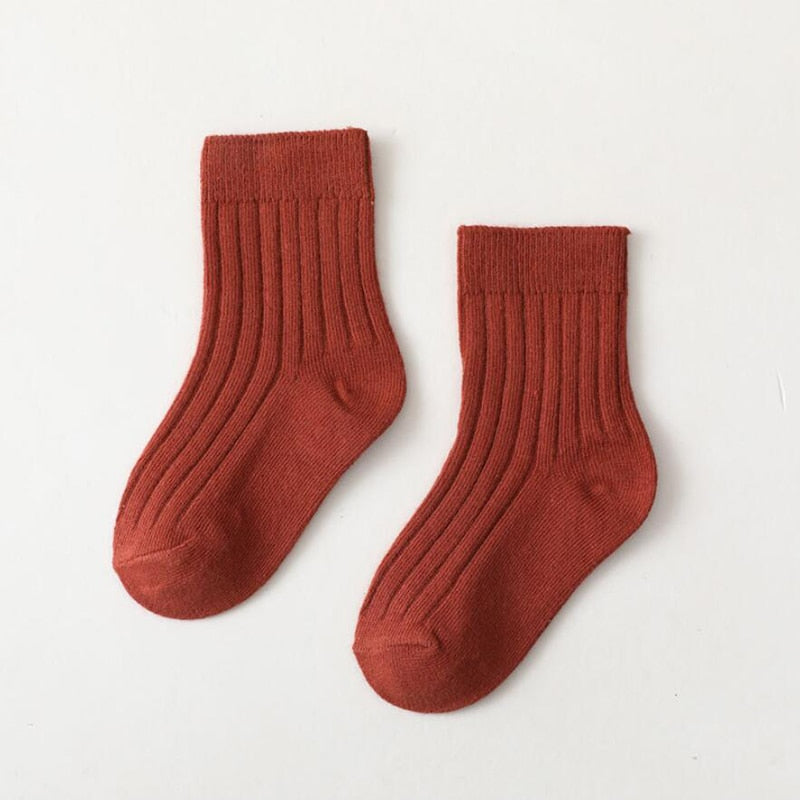 Assorted colorful high neck ribbed socks for baby boys and girls, pure cotton comfort.
