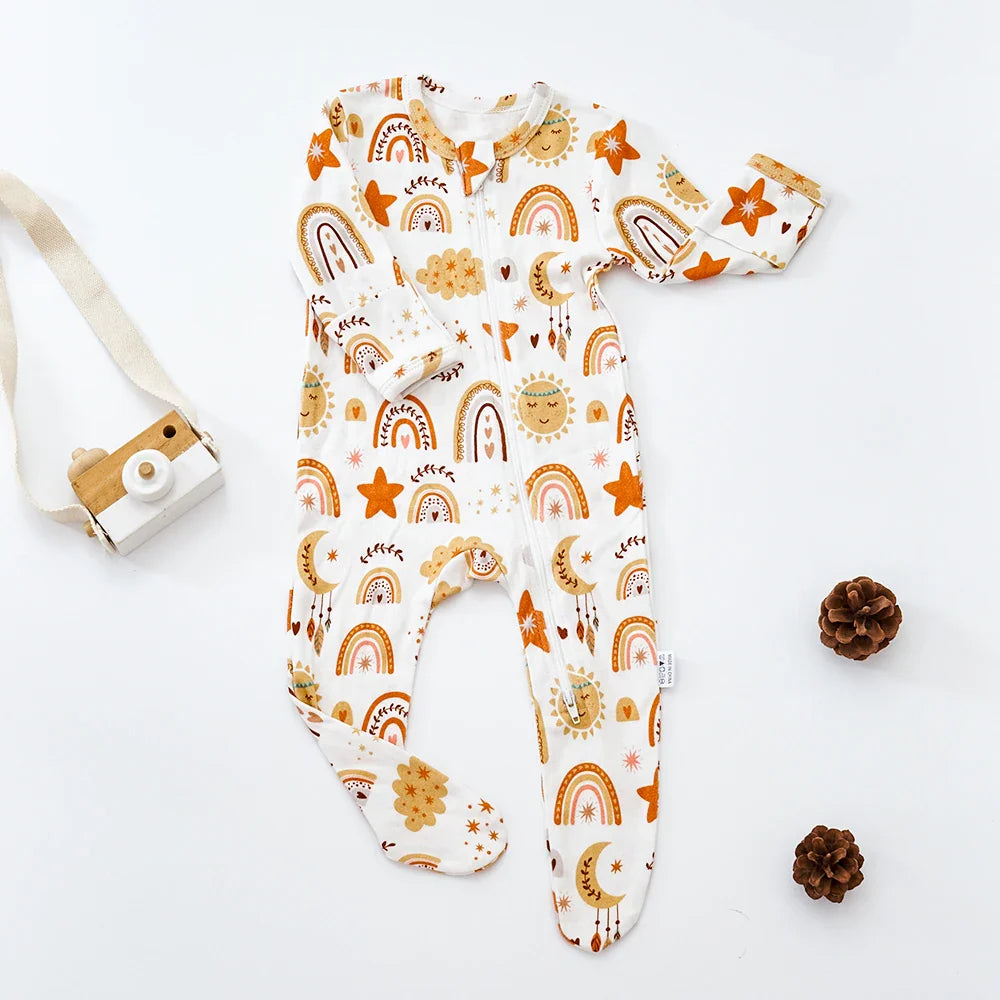 Newborn romper, bamboo cotton, light yellow, detail of non-slip footies for safety and warmth