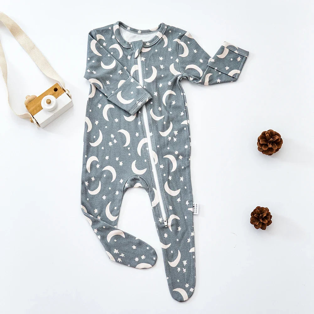 Baby clothing, infant jumpsuit, model wearing, soft bamboo cotton, playing on a blanket, natural light