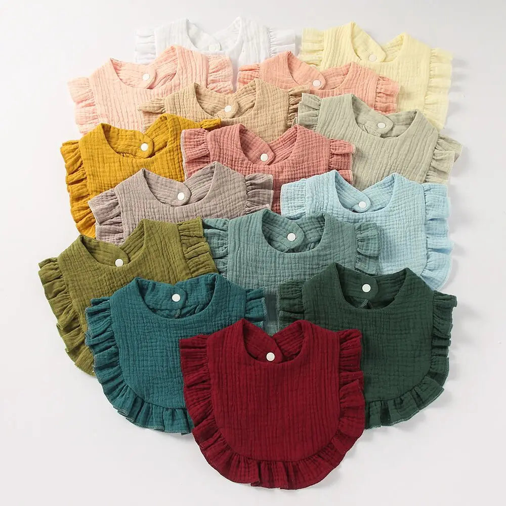 Close-up of a baby ruffle lace bib, saliva towel, ideal for feeding