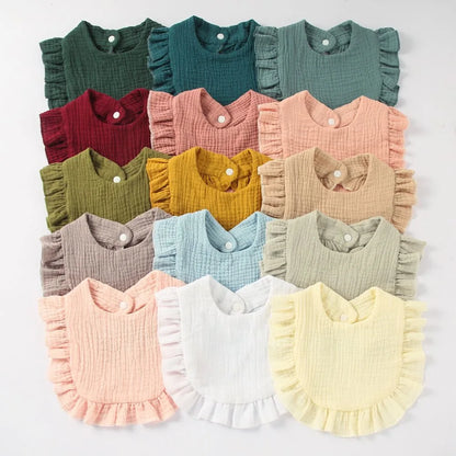 Durable cotton baby bib with ruffle lace trim, feeding friendly