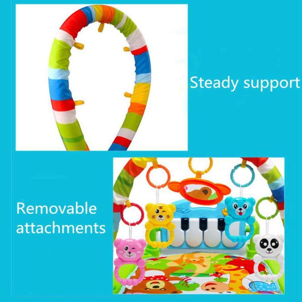 Tummy time mat with an integrated piano and soft, interactive sensory toys, ideal for baby development