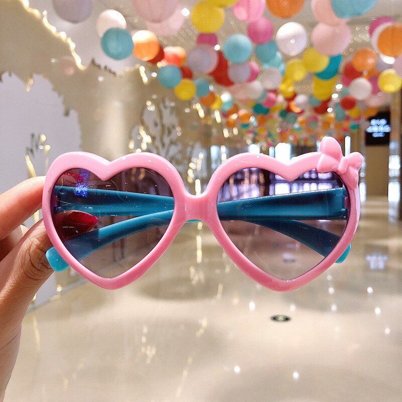 Kids anti-radiation shades, stylish and safe for outdoor adventures.