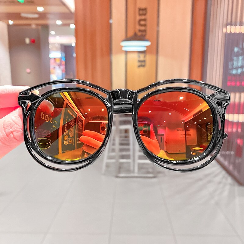 Kids shades with UV protection; toddler fashion anti-radiation sunglasses.