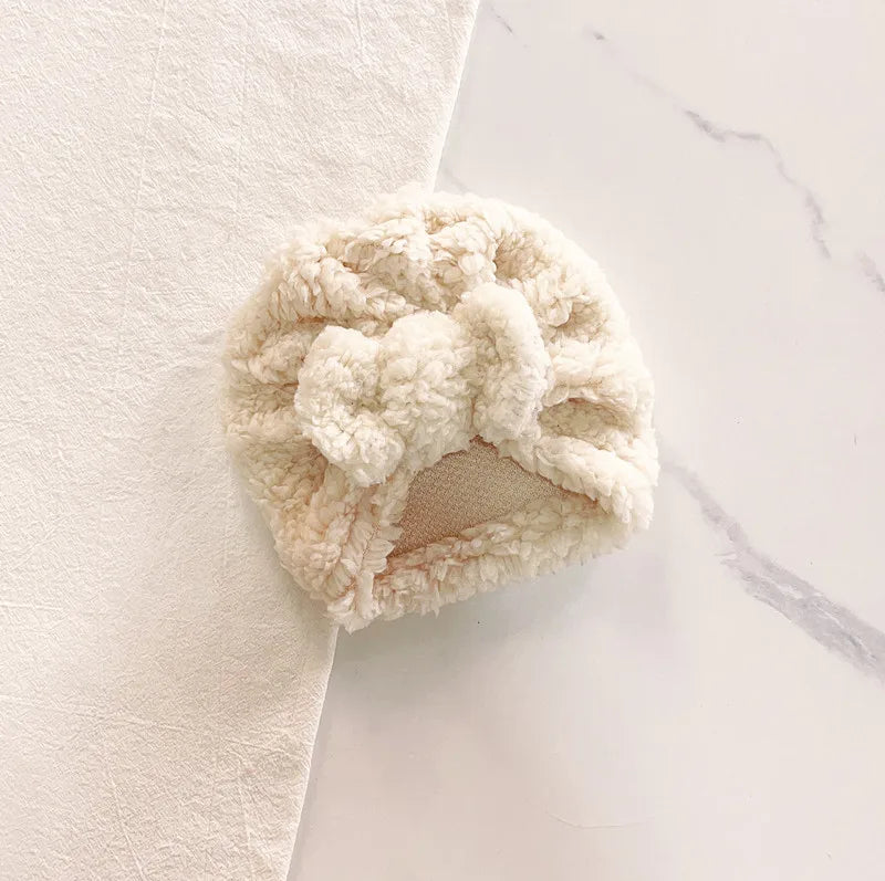 Soft knit baby beanie hat in a vibrant yellow, perfect as a cozy baby accessory for winter.