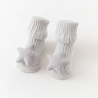 Picture of multi-colored animal anti-slip long socks, warm and secure for baby's feet.