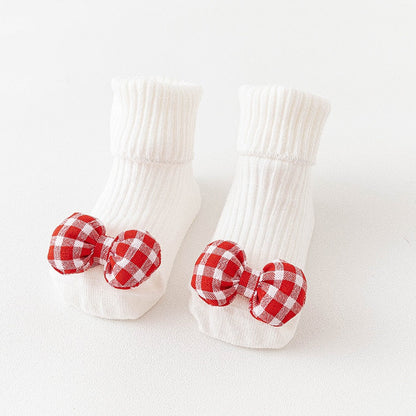 Comfortable anti-slip long socks for babies, featuring various cute animal motifs and soft fabric.