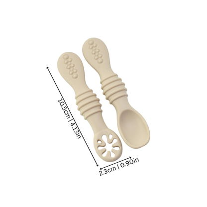Toddler utensils: a set of soft silicone self-feeding spoons, perfect for baby's first solids.