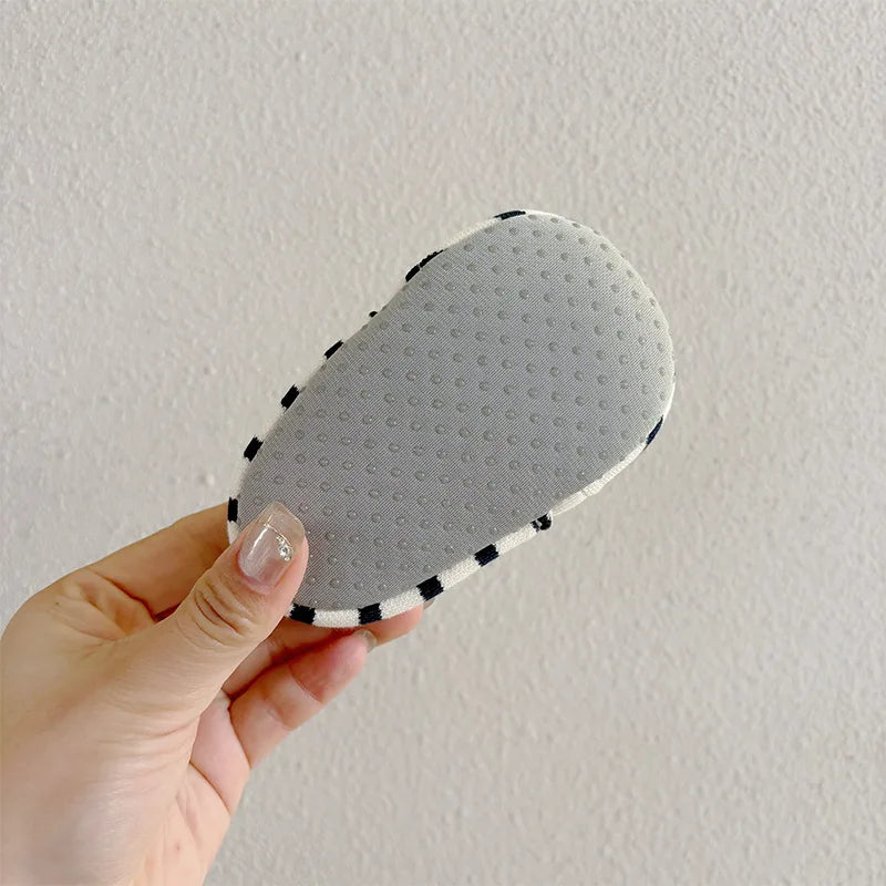 Toddler shoes: comfortable soft-sole anti-slip footwear for baby's first steps.