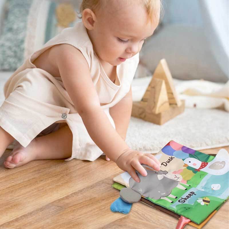 Colorful sensory crinkle book for babies and toddlers, promoting fine motor skills with touch and feel elements.