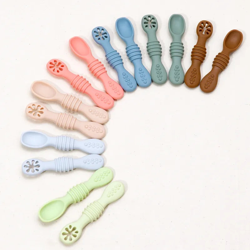 Baby's First Solid Food Silicone Spoons, soft tip for gentle infant feeding, BPA-free baby weaning utensil.