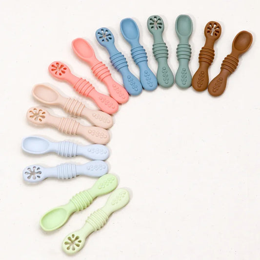 Baby's First Solid Food Silicone Spoons, soft tip for gentle infant feeding, BPA-free baby weaning utensil.