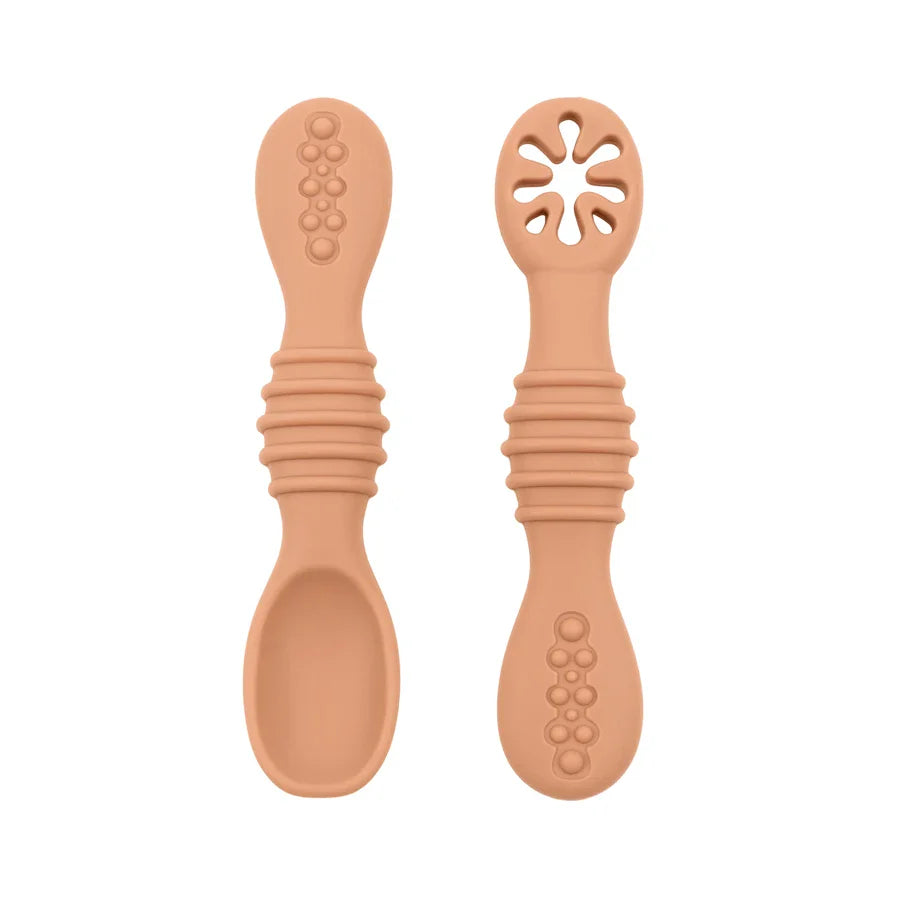 High-quality silicone baby spoons, durable and soft, designed for infant's first solid food experience.