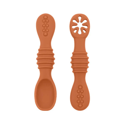 Brightly colored baby silicone spoons, perfect size for little hands, safe BPA-free weaning tool.
