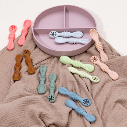 Close-up of soft tip baby spoon, ideal for a baby's first solid food, gentle on gums, BPA-free.