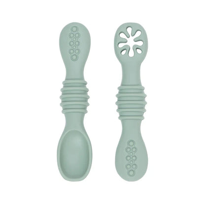 Baby's first feeding set: soft silicone spoons, gentle, BPA-free, promoting safe solid food introduction.