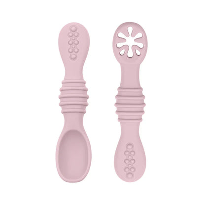 Assortment of silicone baby spoons, non-toxic, ideal for baby-led weaning and infant feeding.