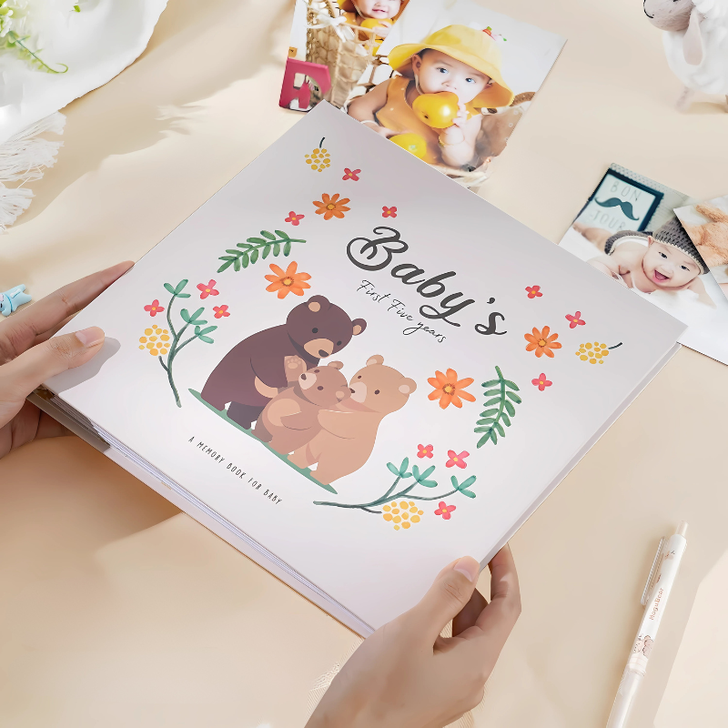 Baby's First Years Keepsake & Milestone Memory Book with cute animal illustrations on cover