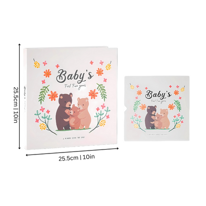 Open Baby's First Years Memory Book showing pages for milestones and photos, neutral design