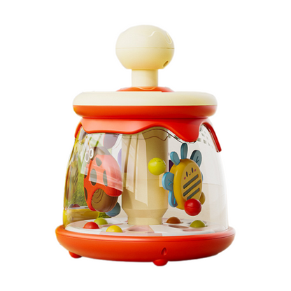 Close-up of a baby's hands reaching for an interactive spinning bug toy, promoting motor skills