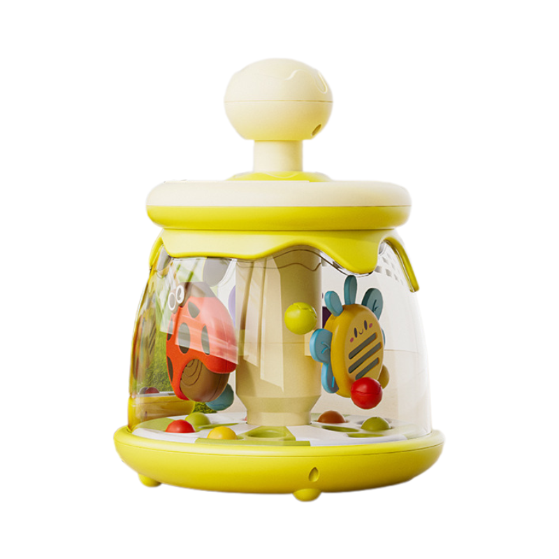 Happy infant engaged with an interactive bug spinner toy, fostering motor skills and fun