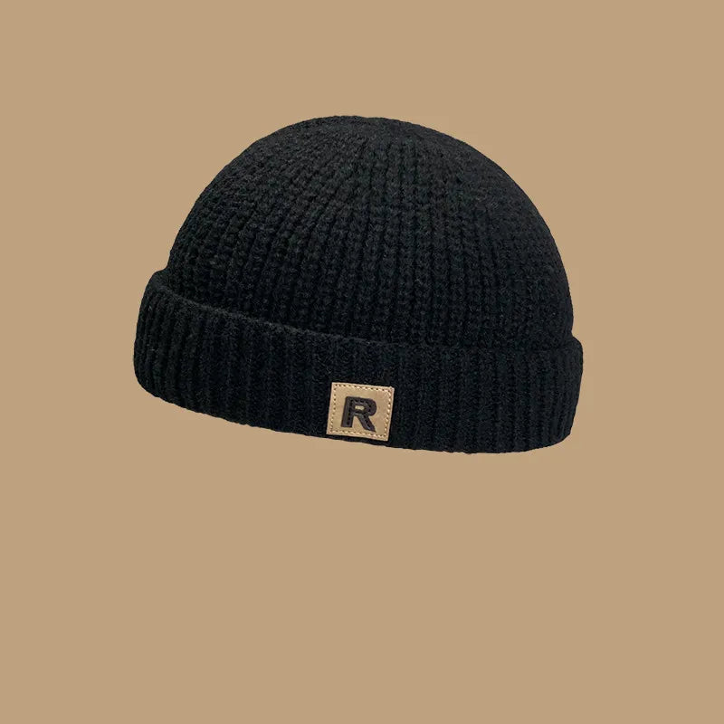 Baby accessories: 'R' letter knitted melon cap, a warm and fashionable hat for infants.