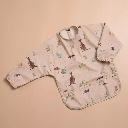 Comfortable long sleeve baby bib crafted from soft, non-toxic waterproof material for safety