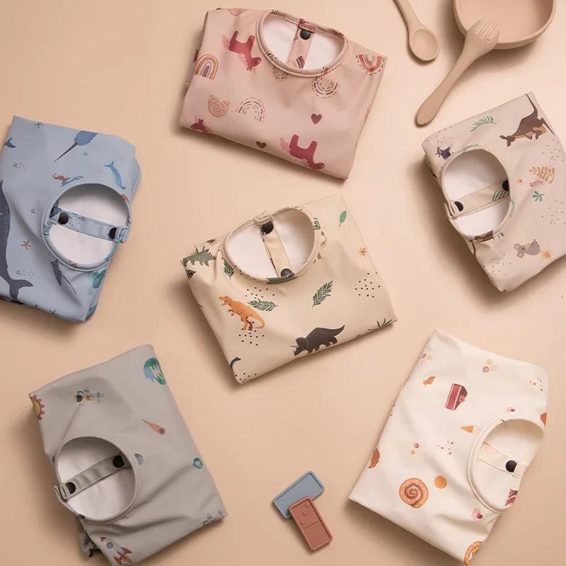 Unisex baby long sleeve waterproof bib with food catcher pocket, easy clean mealtime solution