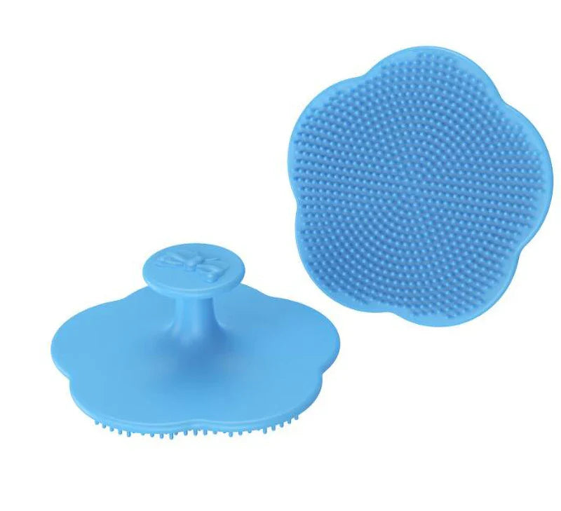 Purple soft silicone baby brush for gentle head massage, promoting healthy scalp development