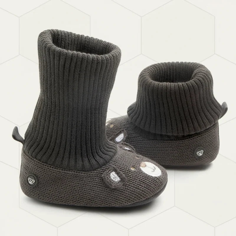 Infant footwear: Gray non-slip winter booties with adjustable closure for warmth.