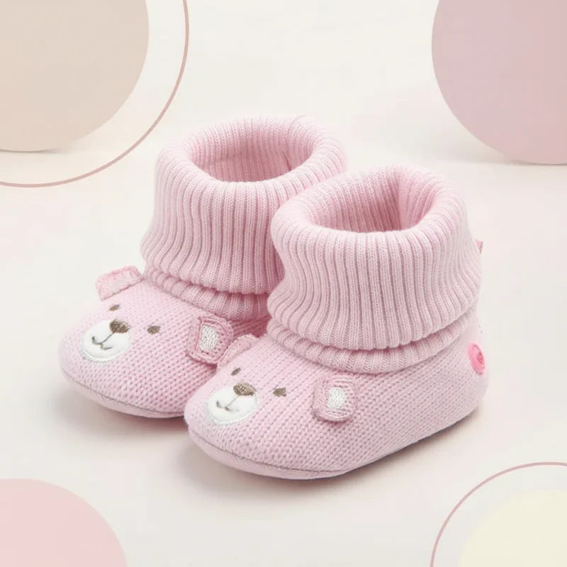 Close-up of the non-slip sole on a warm baby winter bootie, ensuring safety.