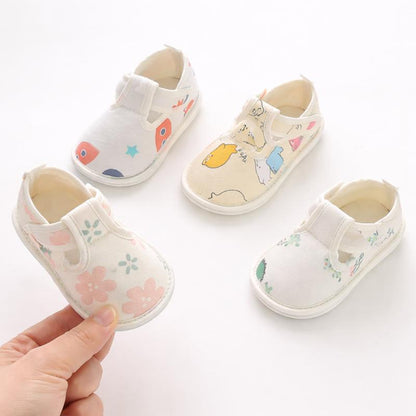 Baby's unisex soft grip first walker shoes in cotton with slip-resistant soles, perfect for infants and toddlers.