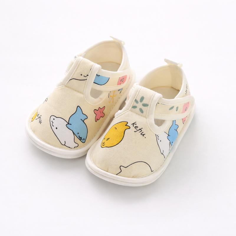 Infant first walker shoes, unisex design with a soft grip and cotton material, ideal for new walkers.